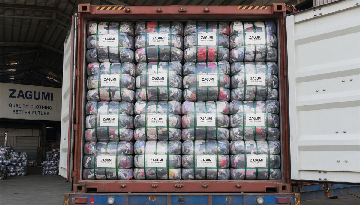 reliable used clothing exporters 25kg bales stacked at warehouse reliable used clothing exporters 25kg bales stacked at warehouse